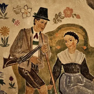 Aktivitäten im Salzburger Land Gemälde eines Mannes und einer Frau, die auf einem Sofa sitzen.