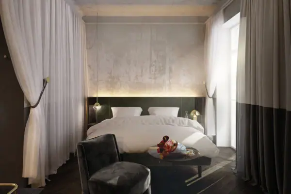 Schlafzimmer mit Bett und Tisch